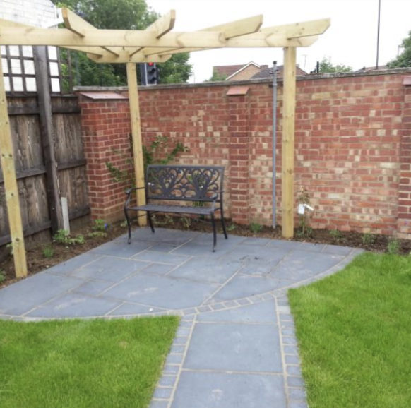 Modern stone patio with integrated seating